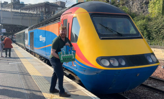 Image of 125 Group HST with Retro Railtours headboard